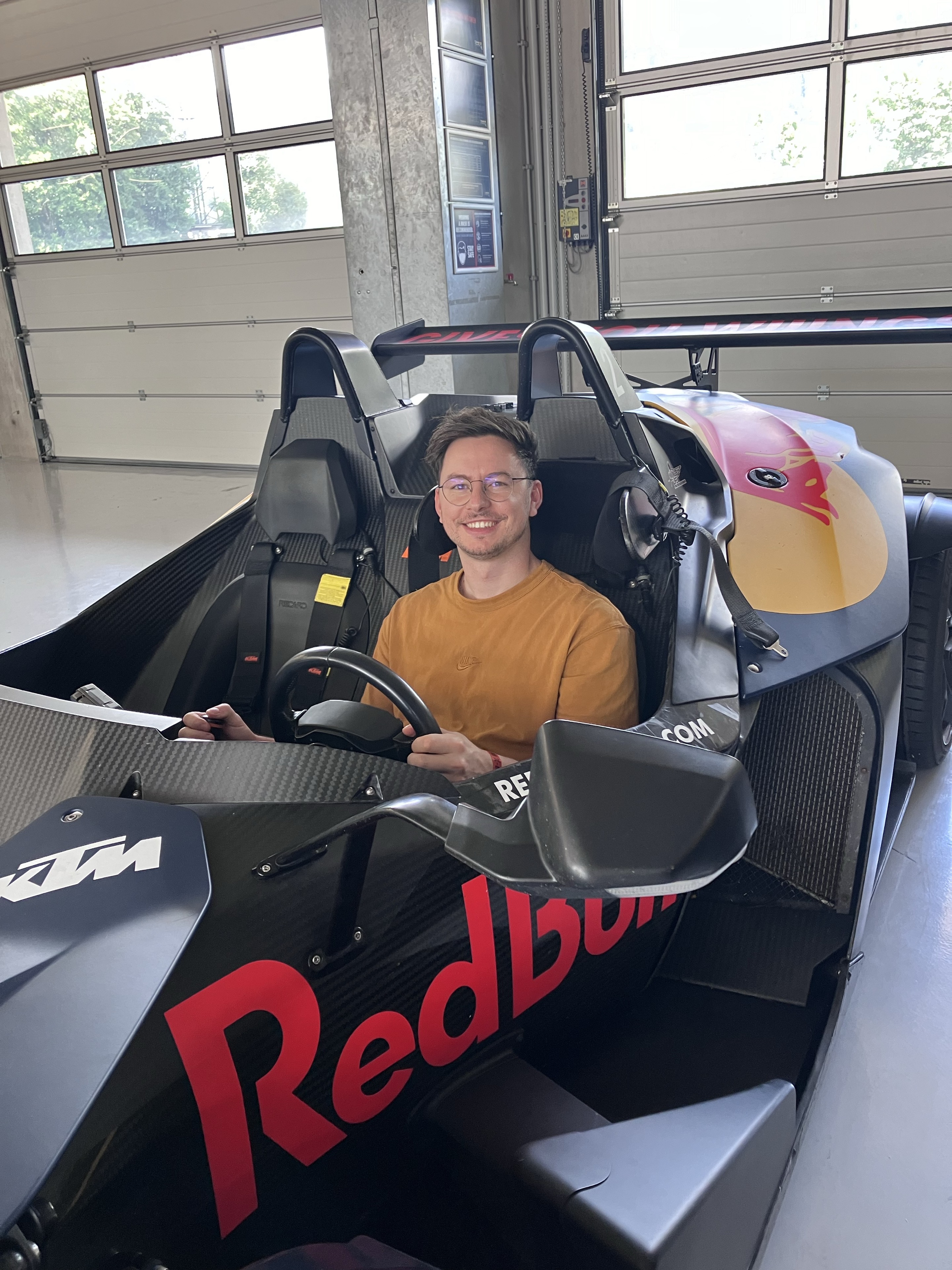 Christoph Steiner am Lenkrad eines KTM X-Bow am Red Bull Ring